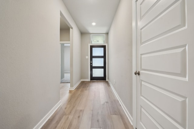 8615 Lake Groove Ln, Baytown, TX 77523 - doorway with light wood-type flooring and recessed lighting