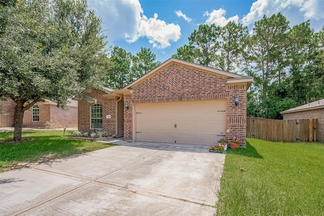 30914 Sweetwater Cir, Magnolia, TX 77355 - view of front of home with brick siding, driveway, and a garage