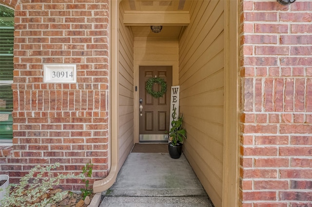 30914 Sweetwater Cir, Magnolia, TX 77355 - view of exterior entry featuring brick siding