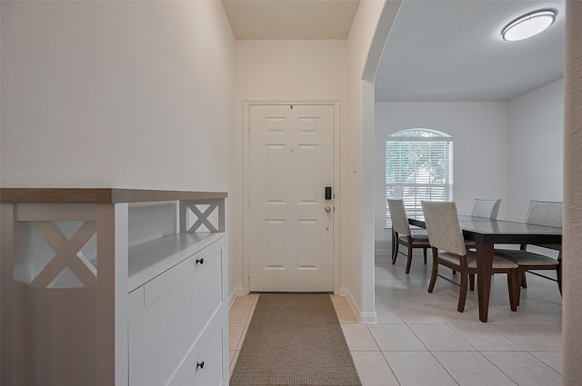 30914 Sweetwater Cir, Magnolia, TX 77355 - entryway featuring arched walkways and light tile patterned floors