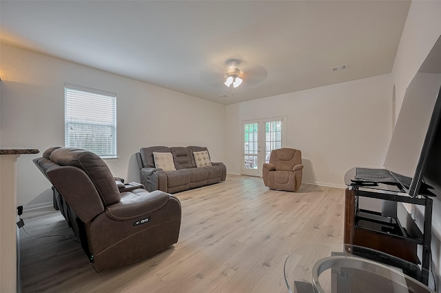 30914 Sweetwater Cir, Magnolia, TX 77355 - living area featuring light wood-type flooring and a ceiling fan
