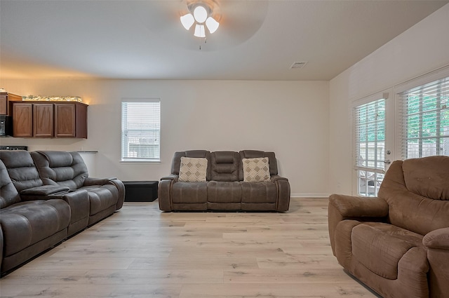 30914 Sweetwater Cir, Magnolia, TX 77355 - living room featuring ceiling fan, healthy amount of natural light, and light wood-style floors