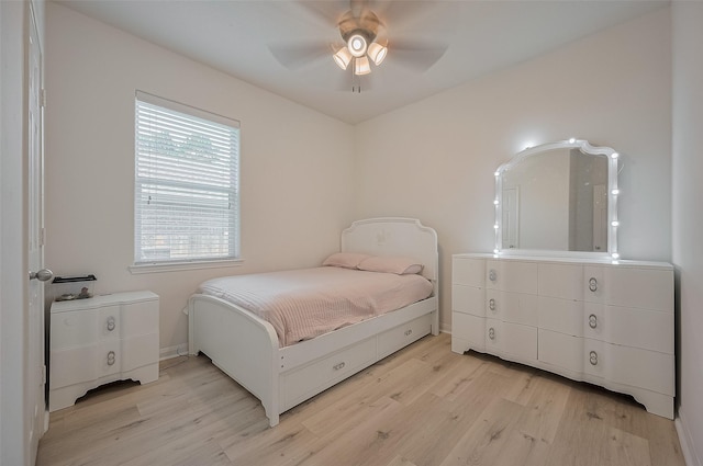 30914 Sweetwater Cir, Magnolia, TX 77355 - bedroom featuring light wood finished floors and ceiling fan