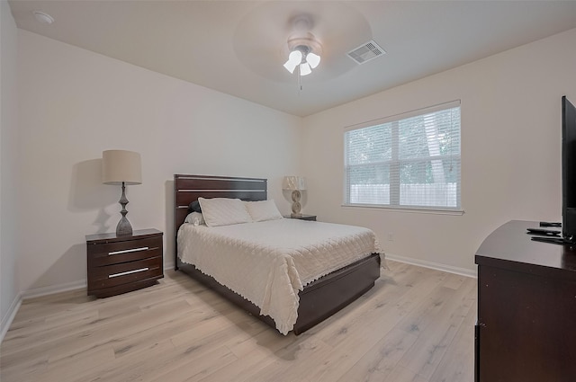 30914 Sweetwater Cir, Magnolia, TX 77355 - bedroom with light wood-style floors and a ceiling fan