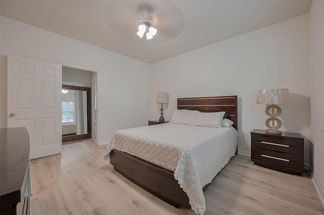 30914 Sweetwater Cir, Magnolia, TX 77355 - bedroom featuring light wood-style floors and ceiling fan