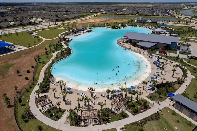 1100 Greenshank Dr, Katy, TX 77493 - drone / aerial view of a nearby body of water and a pool area