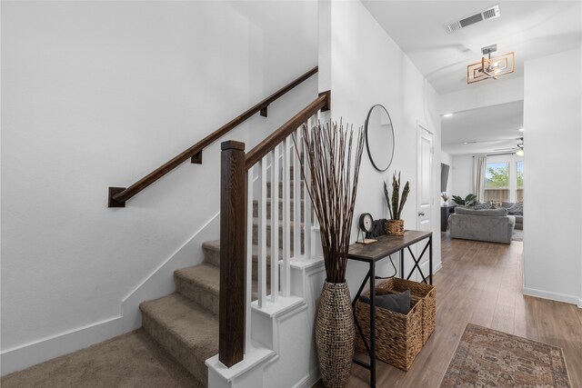 1100 Greenshank Dr, Katy, TX 77493 - stairway featuring wood finished floors and baseboards