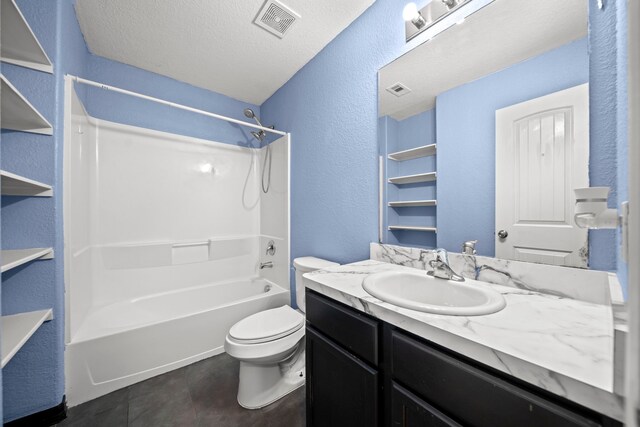 2015 Treasure Mountain Dr, Spring, TX 77388 - bathroom with a textured wall, vanity,  shower combination, and a textured ceiling