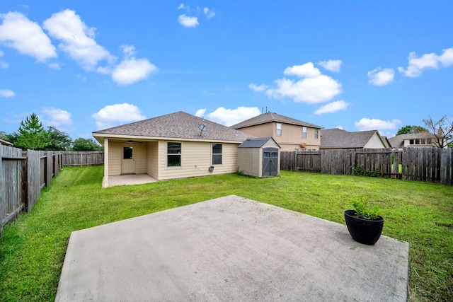 2015 Treasure Mountain Dr, Spring, TX 77388 - back of house featuring ceiling fan, a patio, a storage unit, and a fenced backyard