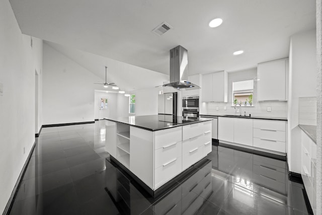 2015 Treasure Mountain Dr, Spring, TX 77388 - kitchen with island range hood, modern cabinets, open shelves, a ceiling fan, and dark countertops