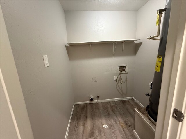 10052 Sharpton Dr, Houston, TX 77038 - laundry area featuring washer hookup, hookup for a gas dryer, dark wood-type flooring, and electric dryer hookup