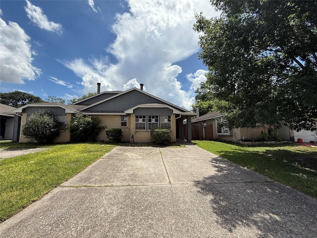 10052 Sharpton Dr, Houston, TX 77038 - ranch-style home with a front lawn and brick siding