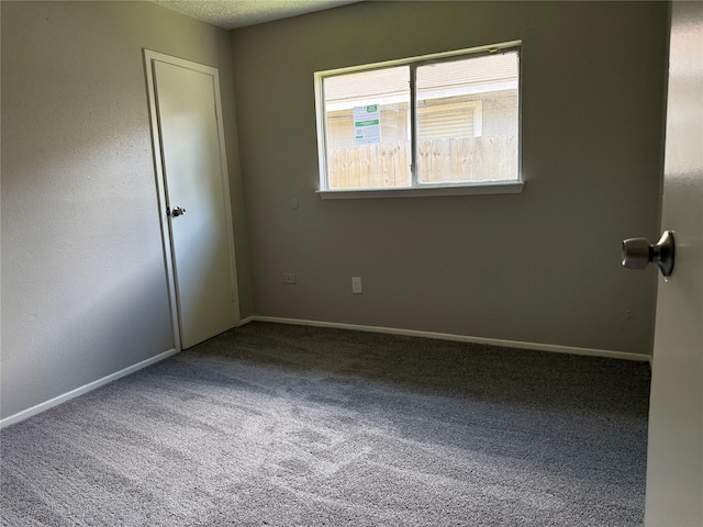 10052 Sharpton Dr, Houston, TX 77038 - carpeted spare room featuring baseboards