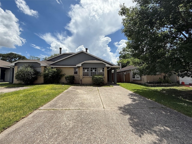 10052 Sharpton Dr, Houston, TX 77038 - ranch-style home featuring a front lawn and brick siding