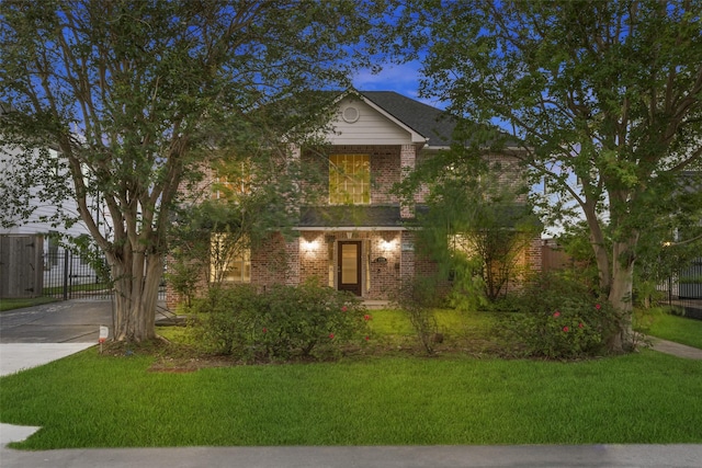 6518 Clawson St, Houston, TX 77055 - view of front facade with brick siding and driveway