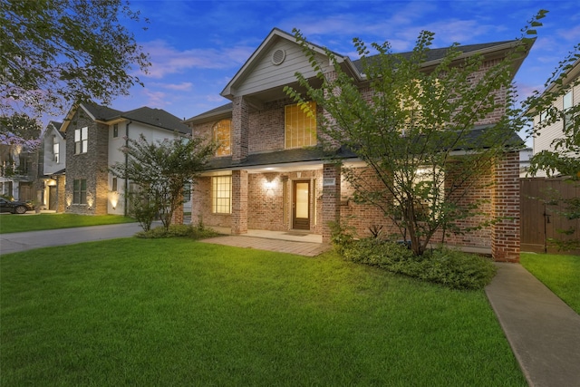 6518 Clawson St, Houston, TX 77055 - traditional-style home featuring brick siding and a front yard