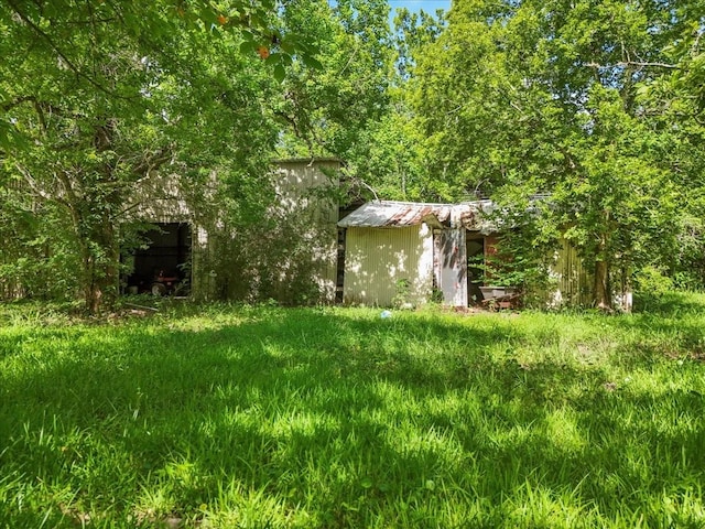 3061 Mary Ln, Dickinson, TX 77539 - view of yard with a storage shed