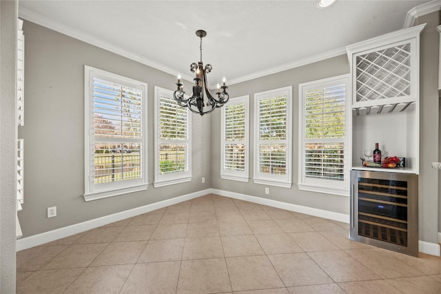 12207 Johns Enterprise Ct, Cypress, TX 77433 - unfurnished dining area with wine cooler, ornamental molding, a chandelier, and light tile patterned floors