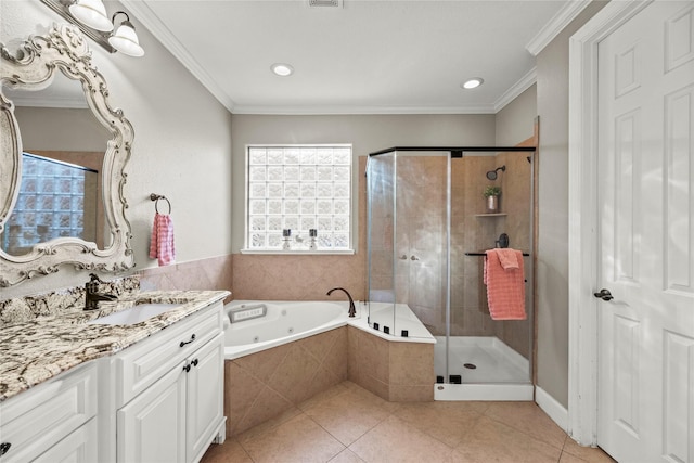 12207 Johns Enterprise Ct, Cypress, TX 77433 - bathroom featuring tile patterned flooring, a jetted tub, vanity, a stall shower, and ornamental molding