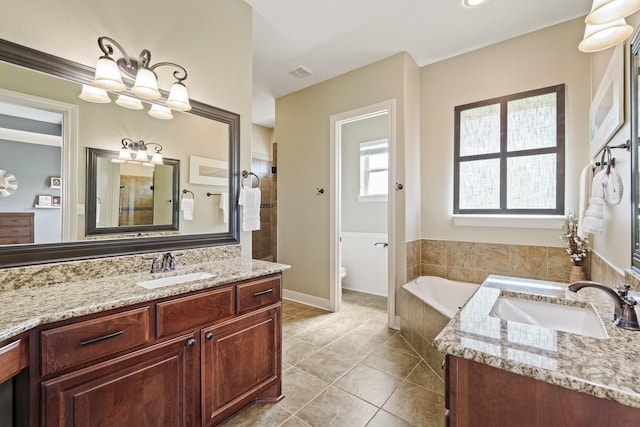 4419 Lea Ln, Fulshear, TX 77406 - full bathroom featuring vanity, tile patterned floors, a garden tub, and tiled shower