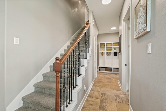 4419 Lea Ln, Fulshear, TX 77406 - staircase featuring stone finish flooring and baseboards