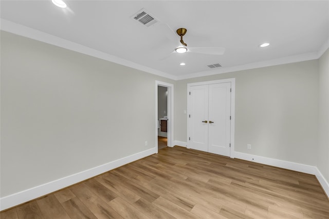 602 W 28th St Unit B, Houston, TX 77008 - unfurnished bedroom featuring ornamental molding, light wood finished floors, recessed lighting, a closet, and a ceiling fan
