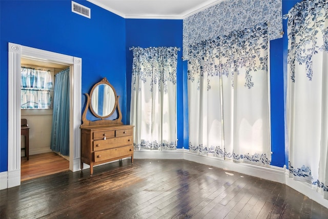 250 N Main St, Jasper, TX 75951 - spare room featuring hardwood / wood-style floors and ornamental molding
