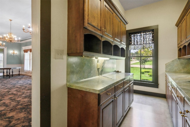 250 N Main St, Jasper, TX 75951 - kitchen with open shelves, a chandelier, and decorative backsplash