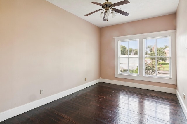 250 N Main St, Jasper, TX 75951 - unfurnished room featuring dark wood finished floors and ceiling fan