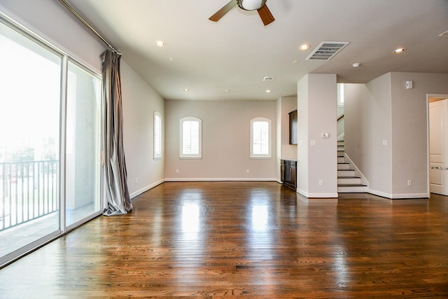 1909 Hickory St, Houston, TX 77007 - unfurnished living room with a ceiling fan, dark wood-style floors, stairway, and recessed lighting