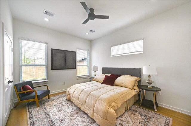 4009 New Orleans St A/B, Unit A/B Houston, TX 77020 - bedroom with wood finished floors, recessed lighting, and a ceiling fan