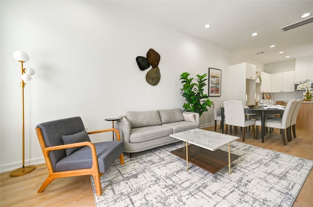 4009 New Orleans St A/B, Unit A/B Houston, TX 77020 - living room featuring light wood-type flooring and recessed lighting