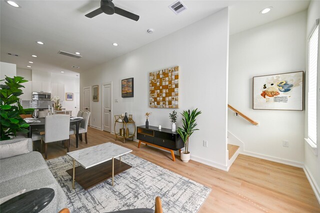 4009 New Orleans St A/B, Unit A/B Houston, TX 77020 - living area with a ceiling fan, stairway, light wood-type flooring, and recessed lighting