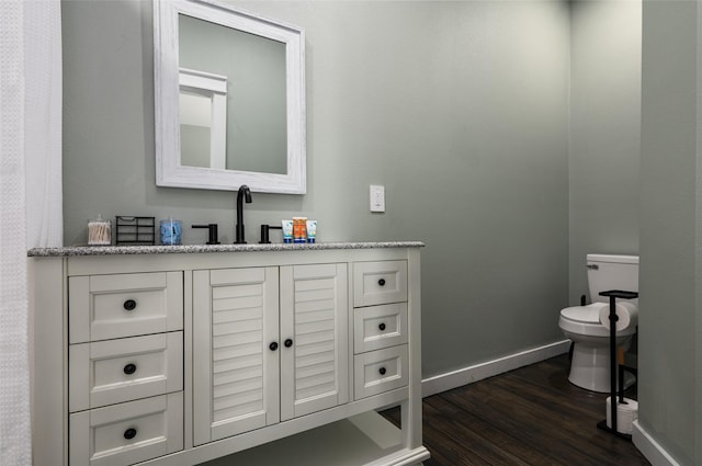 1084 Johnson Rd, Gilchrist, TX 77617 - bathroom with wood finished floors and vanity
