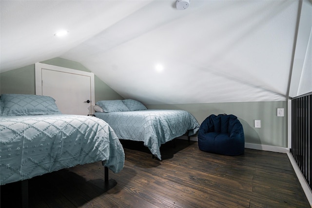 1084 Johnson Rd, Gilchrist, TX 77617 - bedroom with vaulted ceiling and wood finished floors