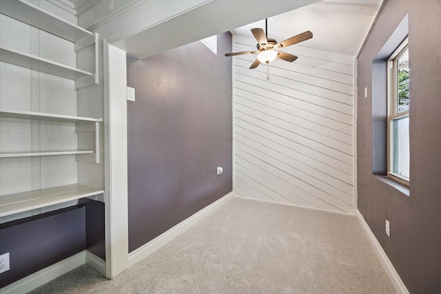 607 Ellingham Dr, Katy, TX 77450 - unfurnished room featuring a ceiling fan, carpet floors, and wooden walls