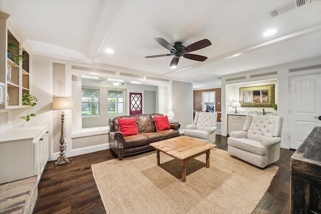 607 Ellingham Dr, Katy, TX 77450 - living room featuring a ceiling fan, dark wood-style flooring, plenty of natural light, recessed lighting, and beam ceiling