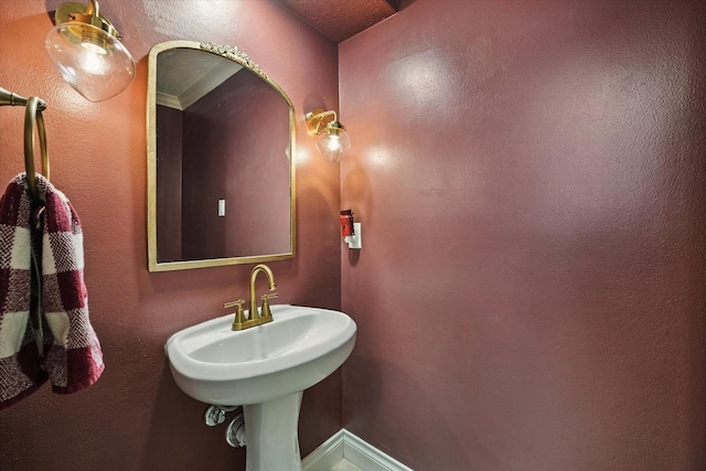607 Ellingham Dr, Katy, TX 77450 - bathroom featuring a sink and a textured wall