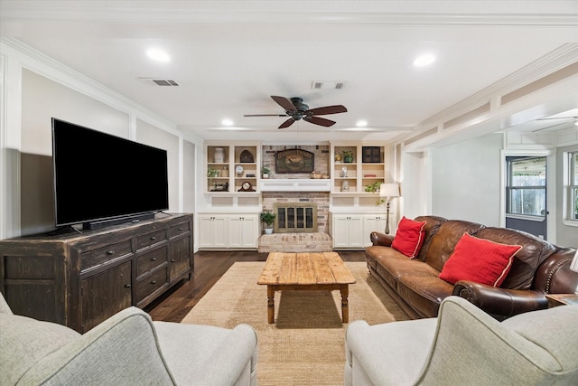 607 Ellingham Dr, Katy, TX 77450 - living room featuring ceiling fan, crown molding, dark wood finished floors, built in shelves, and recessed lighting