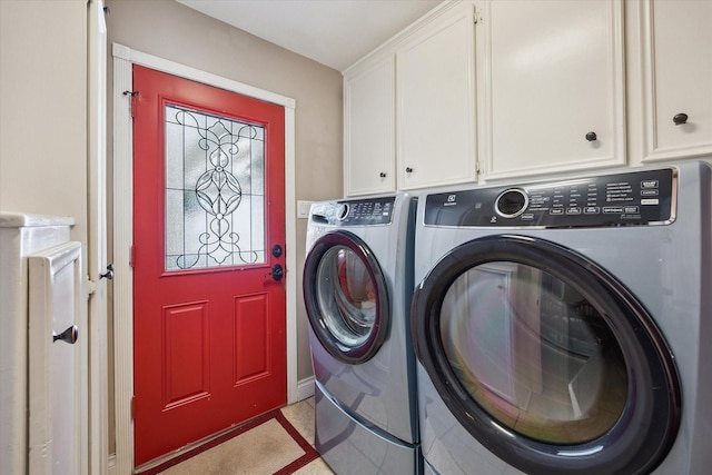 607 Ellingham Dr, Katy, TX 77450 - laundry room with washing machine and clothes dryer, cabinet space, and light tile patterned floors