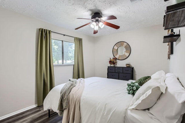 1902 Pepperrell Place Ct, Katy, TX 77493 - bedroom with wood finished floors, a textured ceiling, and a ceiling fan