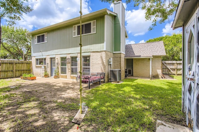 1902 Pepperrell Place Ct, Katy, TX 77493 - rear view of property featuring brick siding, a fenced backyard, a patio, and a chimney