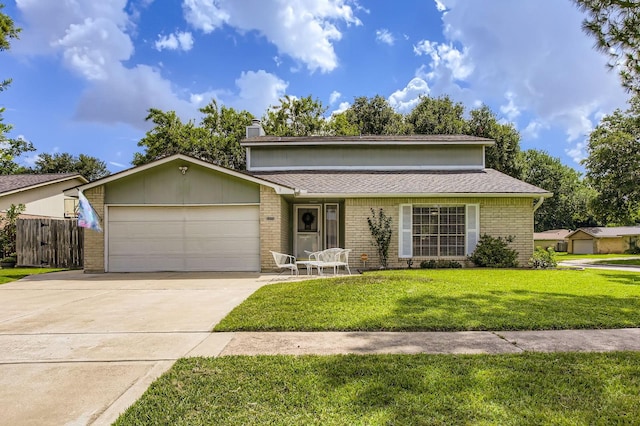 1902 Pepperrell Place Ct, Katy, TX 77493 - view of front of house with an attached garage, driveway, brick siding, and a chimney