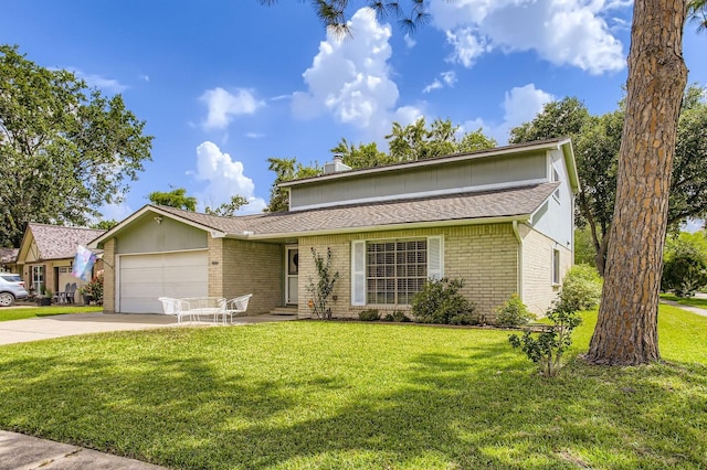 1902 Pepperrell Place Ct, Katy, TX 77493 - view of front of house with brick siding, an attached garage, a front yard, and concrete driveway