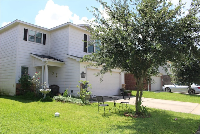 9914 Waldens Pond Ct, Houston, TX 77044 - view of front of home with driveway, a front lawn, and a garage