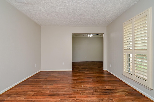 22127 Kerryblue Dr, Katy, TX 77450 - spare room featuring a textured ceiling, wood finished floors, and ceiling fan
