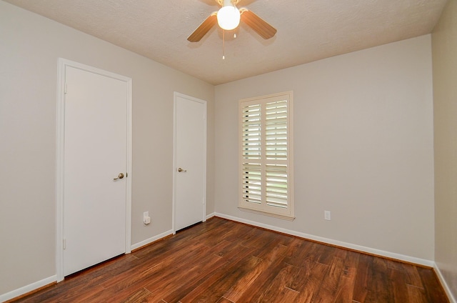 22127 Kerryblue Dr, Katy, TX 77450 - empty room featuring dark wood-type flooring and a ceiling fan