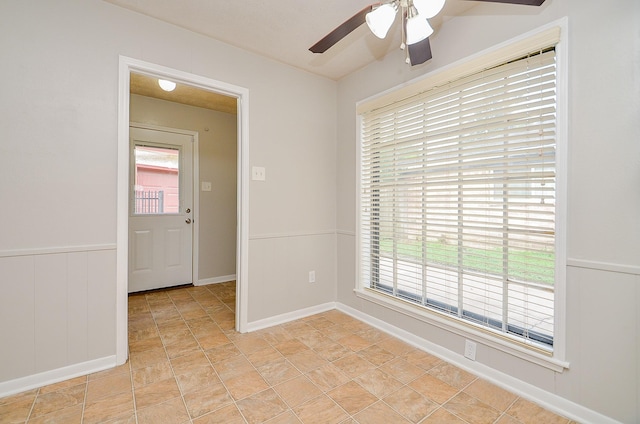 22127 Kerryblue Dr, Katy, TX 77450 - unfurnished room with ceiling fan and stone finish floors