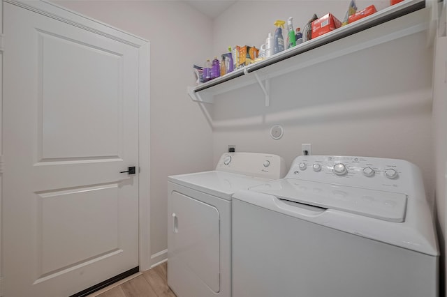 3213 Overfalls Dr, Santa Fe, TX 77510 - washroom featuring washing machine and dryer and light wood-type flooring