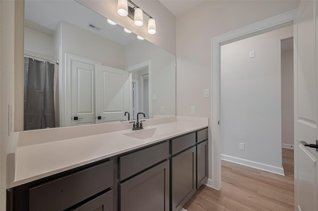 3213 Overfalls Dr, Santa Fe, TX 77510 - bathroom featuring wood finished floors and vanity